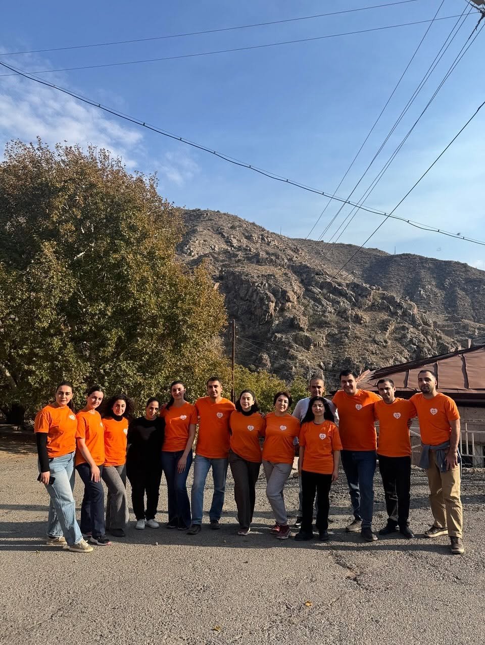 VIVA Foundation volunteer team in orange shirts during a regional visit in Armenia
