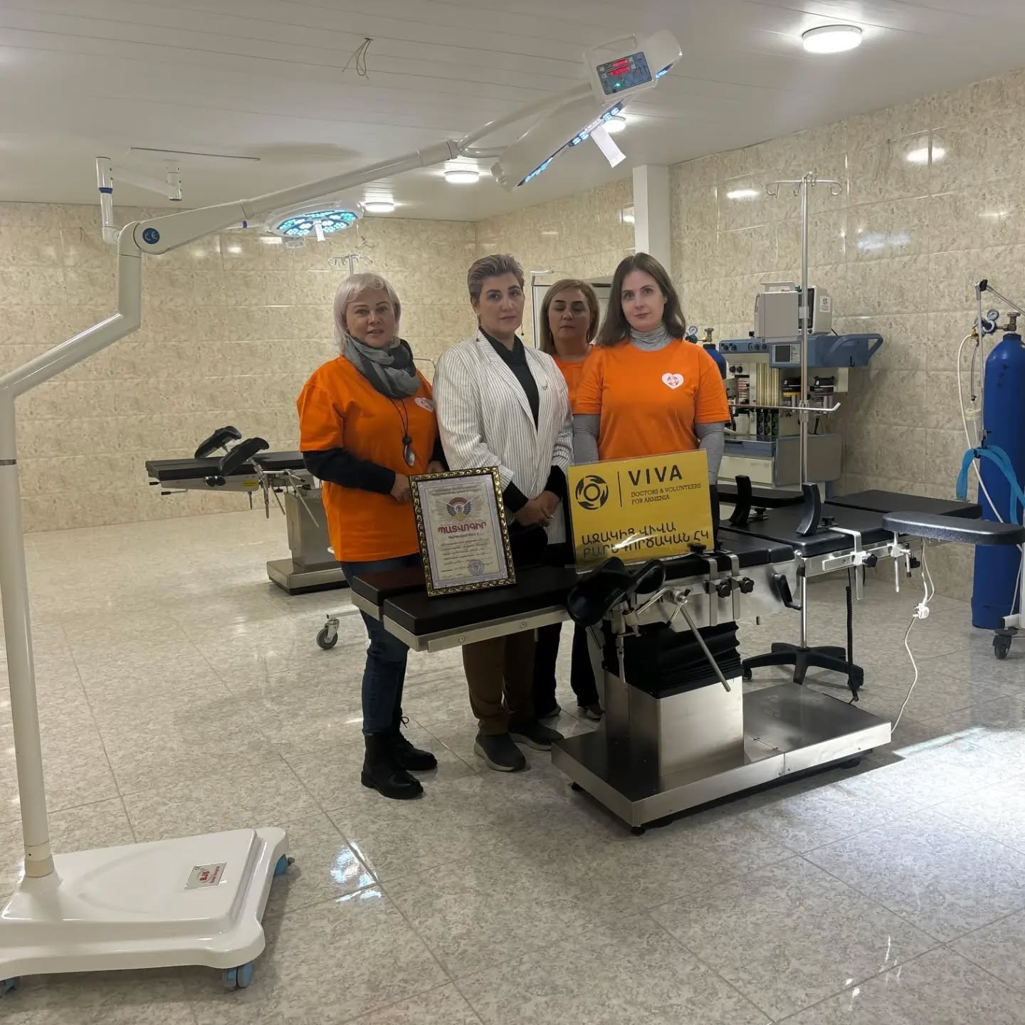 VIVA volunteers and medical staff with new operating-room equipment at a regional hospital in Armenia